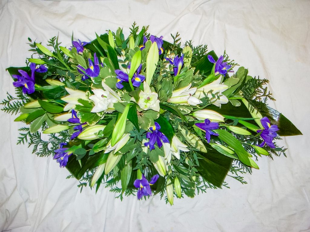White Oriental Lilies Longi Lilies and Mixed Foliage Coffin Arrangement