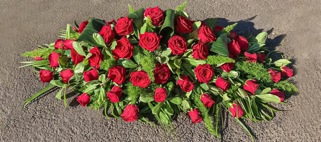 Coffin Arrangement in Red Roses And Mixed Foliage, Florist, Radcliffe